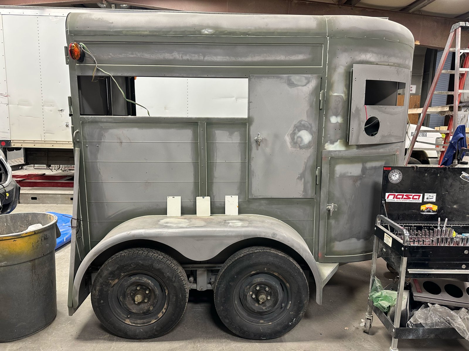 The stripped horse trailer during its restoration.